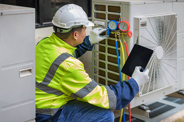 Professional Heat Pump Repair technician working in Corinth, NY